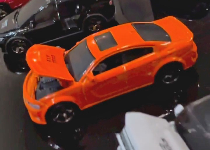 Matchbox Moving Parts Dodge Charger Hellcat Widebody in Orange